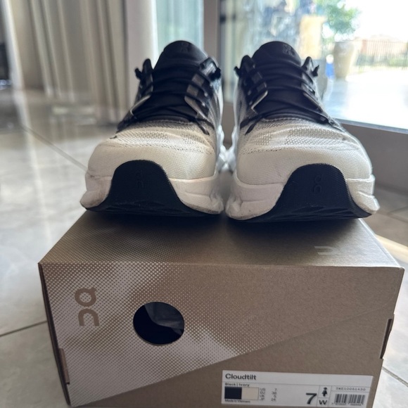 On Running White and Black Sneakers with Sleek Design - Picture 8 of 8